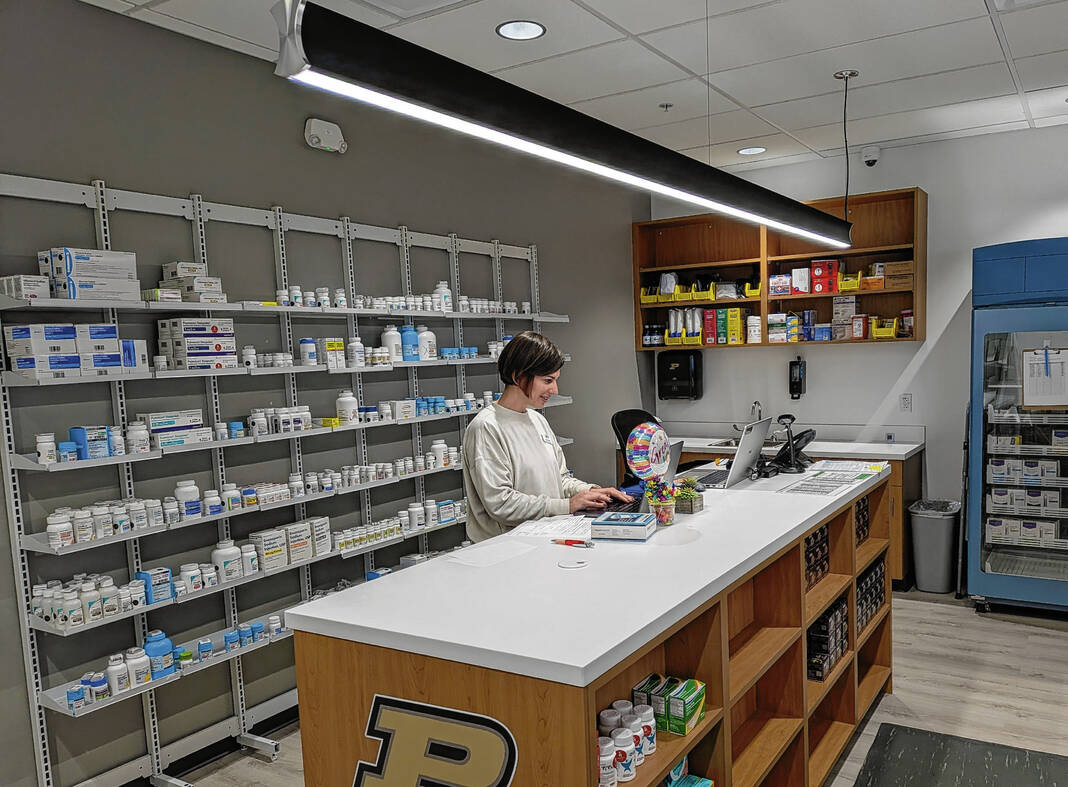 Pharmacist inside PMMCP